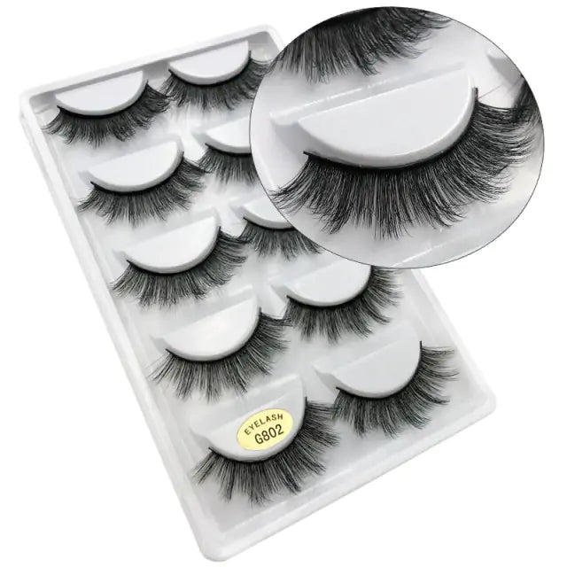 Luxurious 3D mink eyelashes in natural black, packaged elegantly for Skin Deep Beauty&More.