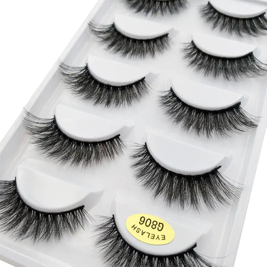 Set of natural-looking 3D mink eyelashes on a clear tray, ready for application from Skin Deep Beauty&More.