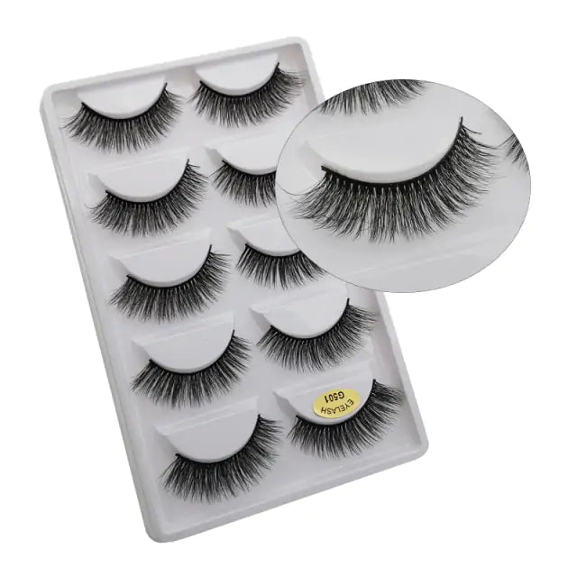 5 pairs of luxurious 3D mink eyelashes in a plastic tray, showcasing natural-looking and dramatic lash styles for eye-catching makeup looks.